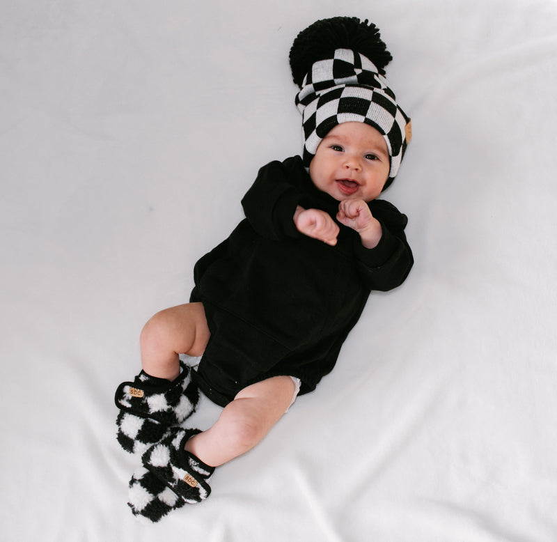 The Newborn Sherpa Bootie — Black + White Checkered