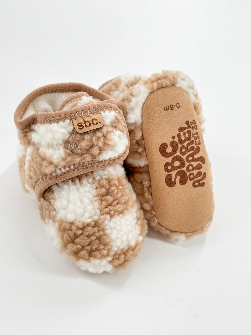 The Newborn Sherpa Bootie — Camel + White Checkered